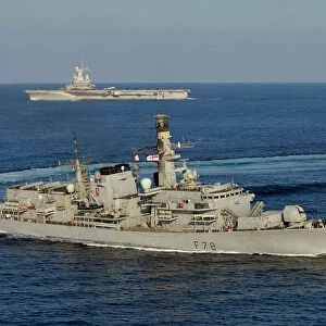 HMS Kent carries out manoeuvres with French Ship FS Charles De Gaulle as the pair