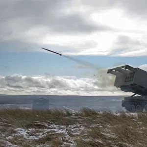 MLRS captured as a training round leaves the launch tube on the ranges at Otterburn