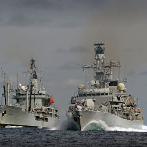 Picture are, on the left RFA GOLD ROVER, and on her right HMS LANCASTER sailing together
