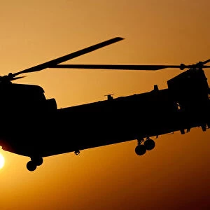 A RAF Chinook Helicopter Takes Off on a Dawn Mission Over Helmand, Afghanistan