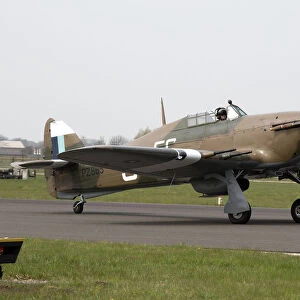 RAF Coningsby Station Commander taxies a Hurricane Mk IIC of the BBMF at RAF Conningsby