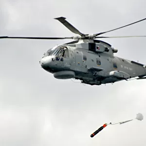 Royal Navy Merlin Helicopter Launching a Training Torpedo
