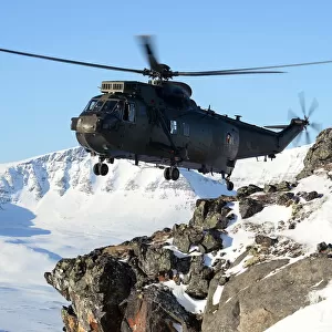Royal Navy Seaking Mk4 Helicopter Over Northern Norway