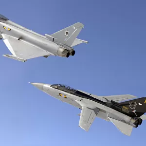 A Typhoon F2 fighter in close formation with a Tornado F3