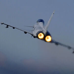 A Typhoon F2 fighter jet pilot applies the throttle as the aircraft pulls away