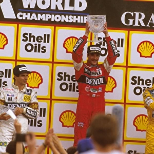 1987 British Grand Prix: Nigel Mansell 1st position, Nelson Piquet and Ayrton Senna 3rd position on the podium