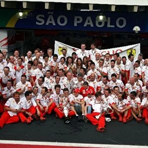 Formula One World Championship: The Ferrari team celebrates winning the World Championship