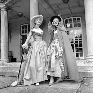Actresses and models take part in a 18th century fashion parade at Pinewood Studios