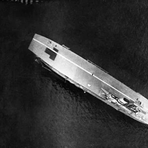 Aerial picture taken at Scapa of secret Fleet tenders - merchant ships camouflaged with
