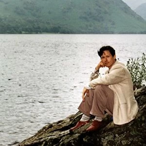 John Broughton Actor plays Joe Coronation Street sits on a lake side rock as he