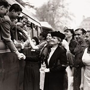 Madame Benes wife of Dr. Benes bids goodbye to the Czech troops before their departure
