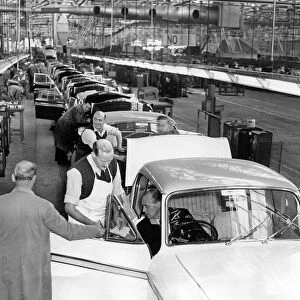 Men at work on the Rapier track at the Rootes Group factory at Ryton, Coventry