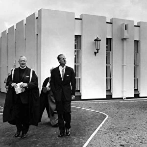 Prince Philip, Duke of Edinburgh, leaves the new library with the principal