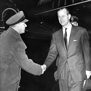 Prince Philip, Duke of Edinburgh, is welcomed to Ouston by Squadron-Leader Baker