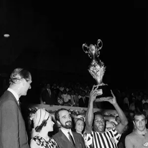 Queen Elizabeth II presented the trophy to Pele after his team Santos played at