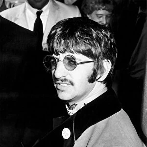 Ringo Starr drummer with the Beatles leaving hospital after his second child Jason was