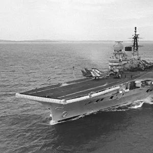 Royal Navy Aircraft Carrier HMS Victorious August 1959 steams through the Solent with